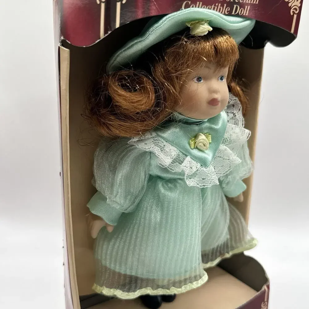 Limited Edition Hand Painted 6 in Porcelain Girl Doll Brown Curly Hair Outfit